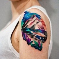 Illustrative style colored shoulder tattoo of mountains with flowers
