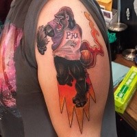 Illustrative style colored shoulder tattoo of monkey basketball player