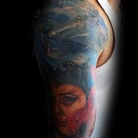 Illustrative style colored shoulder tattoo of WW2 plane with cild portrait
