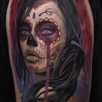 Illustrative style colored shoulder tattoo of Mexican woman portrait