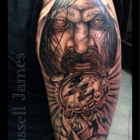 Illustrative style colored shoulder tattoo of mystical man with broken clock