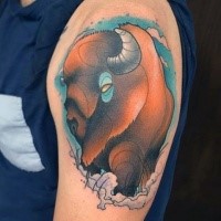Illustrative style colored shoulder tattoo of big bull