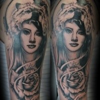 Illustrative style colored shoulder tattoo of woman face with wolf skin and rose