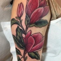 Illustrative style colored shoulder tattoo of big pink flower with leaves