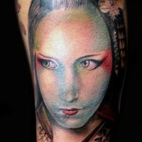 Illustrative style colored tattoo of woman geisha