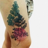 Illustrative style colored thigh tattoo beautiful plants