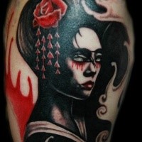 Illustrative style colored thigh tattoo of geisha woman