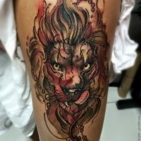 Illustrative style colored thigh tattoo of lion head