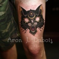 Illustrative style colored thigh tattoo of fantasy cat mask