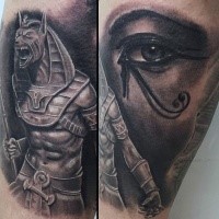 Illustrative style colored thigh tattoo of Egypt God with woman eye