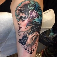 Illustrative style designed by Jenna Kerr upper arm tattoo of woman with hear shaped diamond