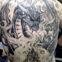 Illustrative style detailed whole back tattoo of big dragon and burning city