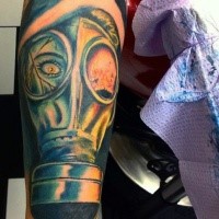 Illustrative style large colored forearm tattoo of creepy woman in gas mask