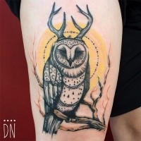 Illustrative style painted by Dino Nemec thigh tattoo of strange owl
