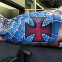 Illustrative style red colored cross with spider web tattoo on biceps