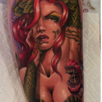 Illustrative style seductive looking colored leg tattoo of sexy Nature woman