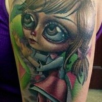 Impressive 3D like creepy girl doll tattoo on shoulder with big red heart