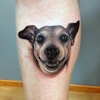 Impressive 3D like funny dog portrait tattoo on leg