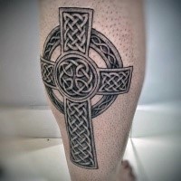 Impressive Celtic cross gray ink tattoo on calf