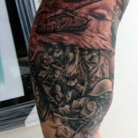 Impressive detailed and colored military tattoo on leg