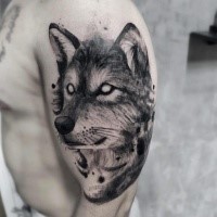 Impressive dot work style black ink  upper arm tattoo of wolf with empty eyes