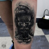 Impressive looking black ink thigh tattoo of dark woman with snake