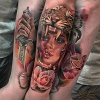 Impressive looking colored arm tattoo of tribal woman with tigers helmet, rose and dagger