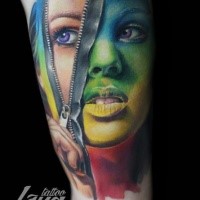 Impressive looking colored arm tattoo woman face with zipper