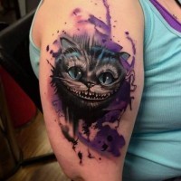Impressive multicolored shoulder tattoo of Cheshire Cat face