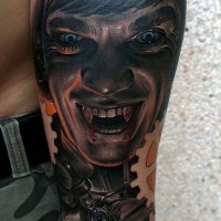 Impressive painted and colored bloody vampire man tattoo on arm