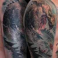 Tatuaje en el brazo,  monstruo fantástico bien dibujado