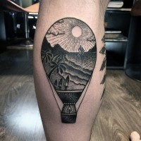 Impressive painted big flying balloon with picture tattoo on leg