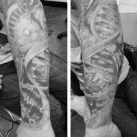 Impressive very detailed black ink DNA tattoo on arm