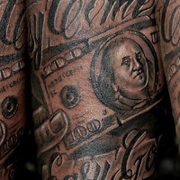 Incredible black ink forearm tattoo on money bill with lettering