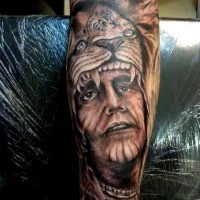 Incredible designed American native old Indian portrait tattoo on forearm with helmet from lion skin