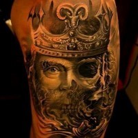 Incredible designed colored upper arm tattoo of creepy monster king