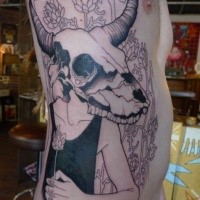 Incredible looking black ink large side tattoo of human with flowers and deers skull