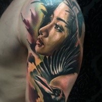 Incredible looking colored shoulder tattoo of woman with crow