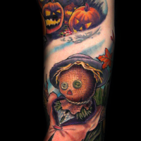 Incredible multicolored Halloween themed tattoo on sleeve zone