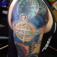 Incredible multicolored space tattoo with old clock tattoo on arm