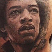 Incredible young Jimi Hendricks realistic portrait tattoo in realism style
