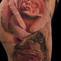 Incredibly realistic detailed giant tea rose flowers with young girl's portraits reflection tattoo on lady's thigh in futuristic style