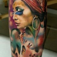 Indian style very realistic colored seductive zombie woman tattoo on arm