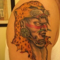 Indian warrior in a helmet from head leopard tattoo