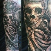 Inedible detailed black ink skeleton with crown tattoo on sleeve