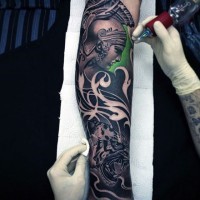 Interesting colored natural looking antic statue on forearm with cheetah
