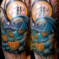 Interesting combined and colored cartoon like Halloween tattoo on arm