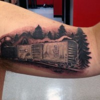 Interesting designed black ink train in tunnel tattoo on arm