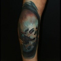 Interesting looking colored tattoo of human skull