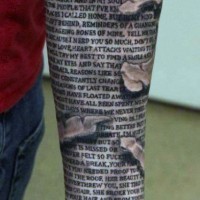 Interesting painted ripped skin old lettering tattoo on sleeve